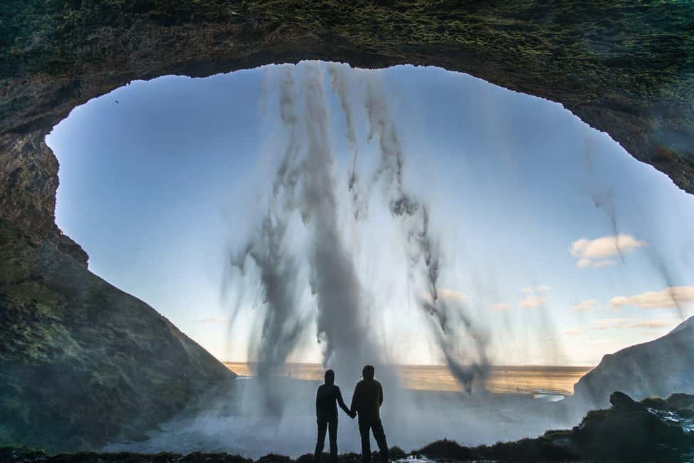 2-Day South Coast, Blue Ice Cave, Glacier Lagoon Tour - Getting there and around: pickup timing, full-sized bus comfort, and the driver