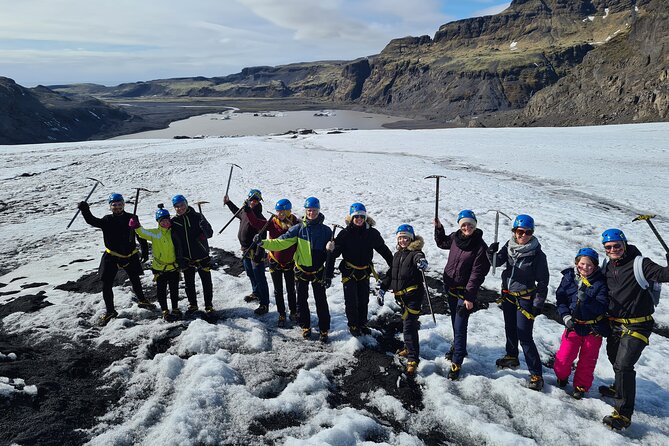 From Reykjavik: Glacier Hike, South Coast and Waterfalls Day Trip - Skógafoss: the 60 m curtain, the stairs, and the treasure chest story