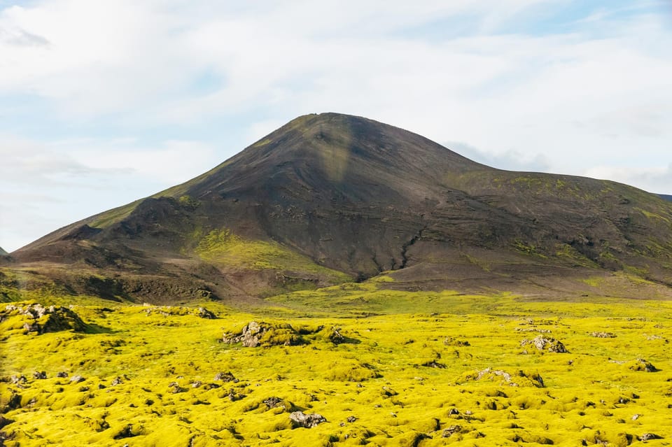 From Reykjavík: Golden Circle Tour and Silfra Snorkeling - Gullfoss Waterfall: standing close to the roar