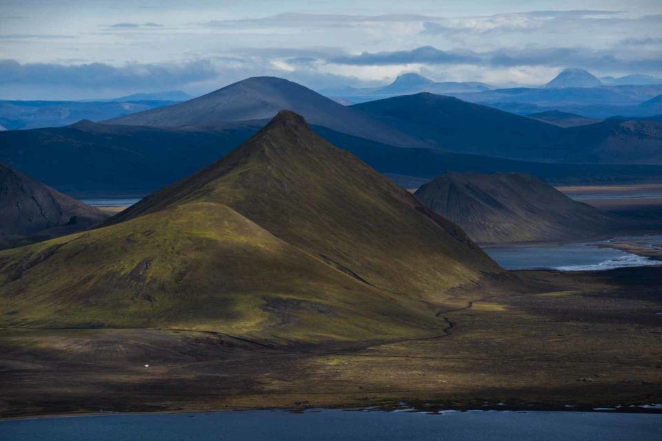 From Reykjavik: Landmannalaugar Day Tour by Luxury Jeep - Landmannalaugar: Colorful Hills, Lava Formations, and a Natural Hot River Bath