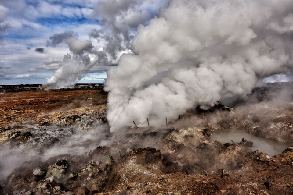 From Reykjavik: Reykjanes Geopark Tour & Airport Transfer - Gunnuhver mud pools: sulfur mystery, ghost stories, and real geothermal power