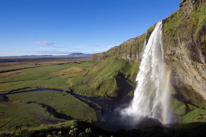 Guided Glacier Lagoon and Diamond Beach Day Trip from Reykjavik - Vik break: dinner time with sea-stack scenery