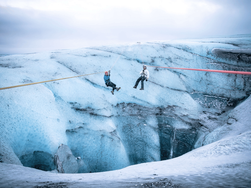 Iceland: Glacier Zip Line Tour with Hike or Ice Cave Visit - Group size, language, and pace: small team energy