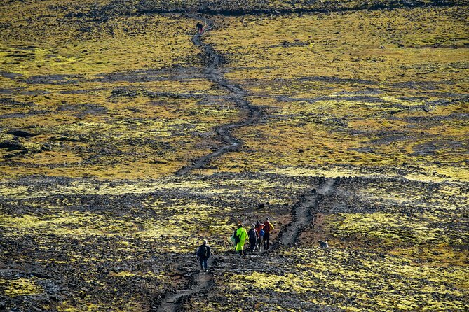 Inside the Volcano: Small-Group Tour and Lava Field Hike - Safety gear and the open cable elevator descent