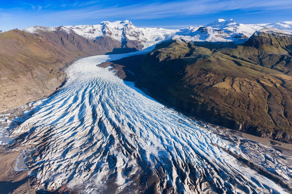Jökulsárlón: Vatnajökull Ice Cave Guided Tour - The walk in: crampons, helmets, and why you should wear real traction-ready shoes