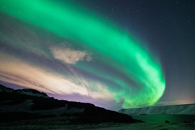 Northern Lights Minibus Tour with Hot Cocoa, Blankets & Photos - Stop Two: what you’ll see, plus blankets and hot chocolate