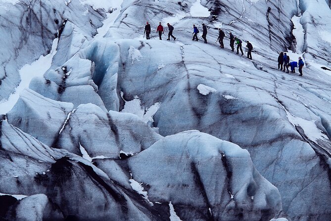 Private Iceland South Coast with Glacier Hike Tour - Stop 2: Skogafoss and the Big-Waterfall Effect