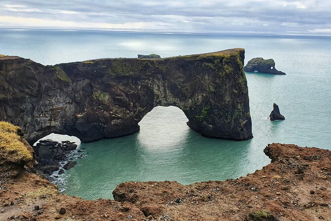 Private South Coast Tour: A Journey to Iceland’s Stunning Shore - Skógafoss: big waterfall energy, plus the steps view