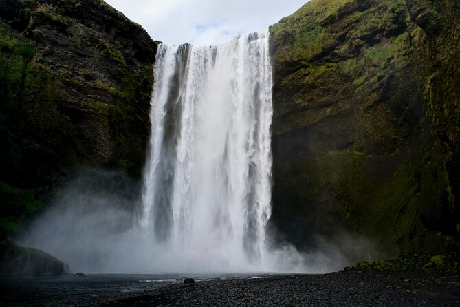 Private South Coast tour in Iceland - Stop 2: Skógafoss, rainbows in the spray, and the treasure legend