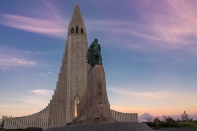 Reykjavik: Guided City Walking Tour - National Theatre to Lýðveldisgarðurinn: public buildings, public meaning