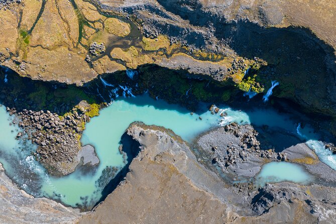 Reykjavík: Landmannalaugar & Icelandic Highlands Super Jeep Tour - Hjálparfoss: The Waterfall with a Name and a Color Story