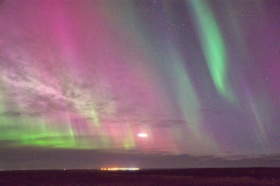 Reykjavík: New Year's Eve Northern Lights Yacht Cruise - What the crew and live guide help you do