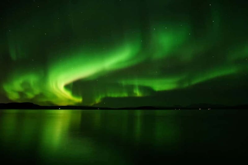 Reykjavik: Northern Lights Adventure Tour with Hot Chocolate - Chasing the Lights: How the Tour Picks a Direction