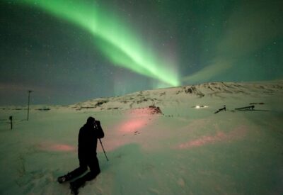 Reykjavik: Northern Lights Group Tour with Photos - What the guide adds besides the chase: science, mythology, hot cocoa