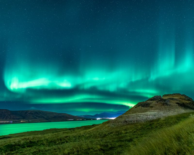 Reykjavik: Northern Lights Group Tour with Photos - Logistics that affect your experience: pickup time, duration, and small-group comfort
