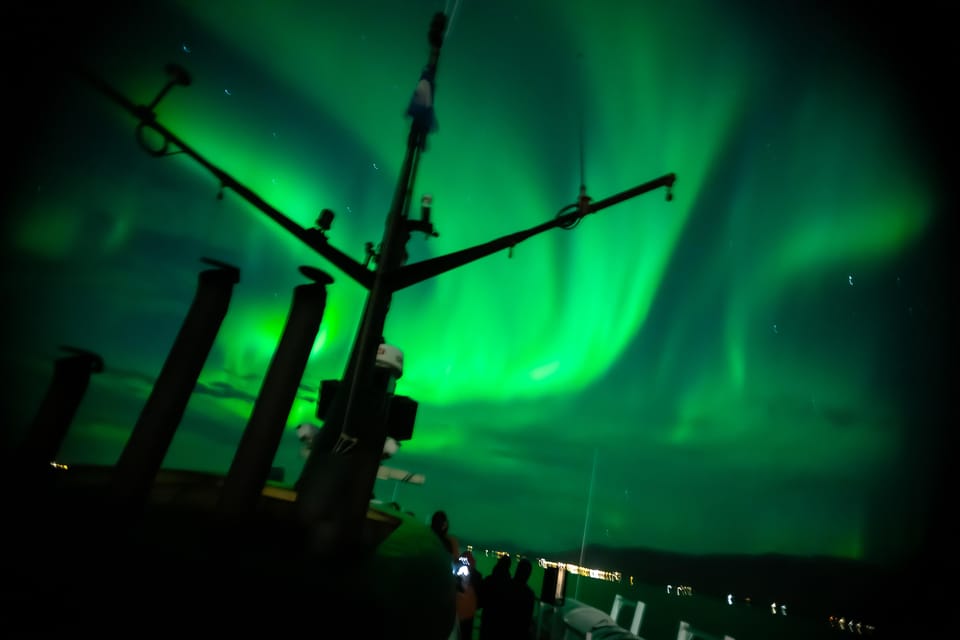 Reykjavik: Northern Lights Guided Boat Tour with Photos - Photos and Onboard Tech: Shooting the Night Without Losing the Moment