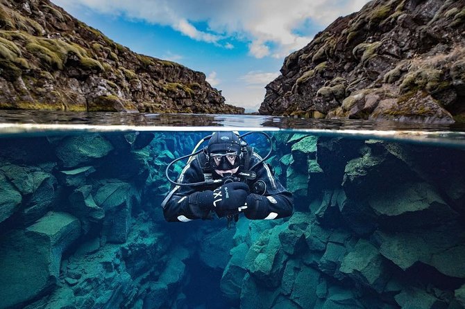 Silfra: Diving Between Tectonic Plates and Pick Up from Reykjavik - Gearing up in a heated van: the drysuit is the whole game