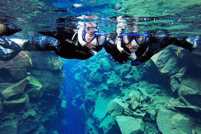 Silfra Drysuit Snorkeling Tour with Free Photos - From Reykjavik - Getting suited in a drysuit: what you must bring