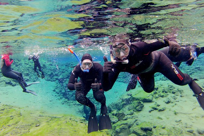 Silfra Drysuit Snorkeling with Free Photos - Meet on Location - The drysuit routine: tight necks, careful seals, and slow prep