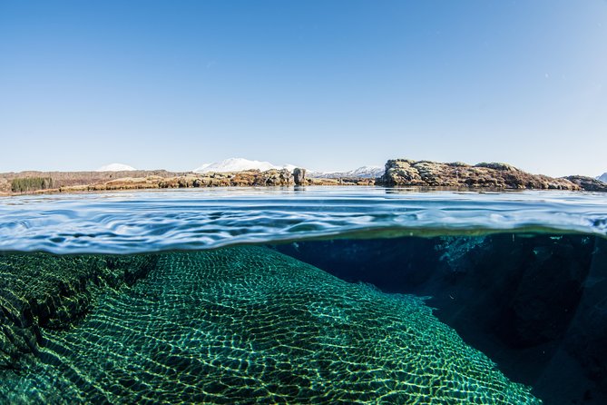 Silfra: Snorkeling Between Tectonic Plates Pick Up from Reykjavik - Heated changing van and dry suit fitting: what to expect before you swim