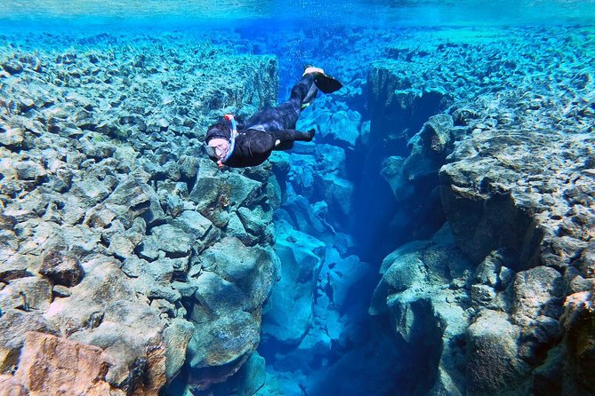 Silfra Wetsuit Snorkeling - Meet on Location | Free Photos - Wetsuit vs dry suit: warmth, freedom, and the fit you’ll feel