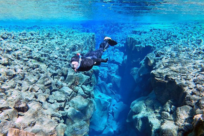 Silfra Wetsuit Snorkeling Tour with Underwater Photos - From Reykjavik - Practical Packing Tips for Comfort, Mobility, and Dry Clothes