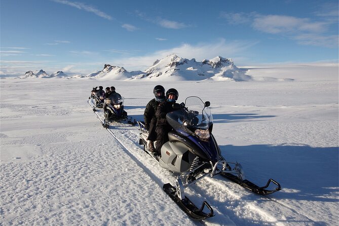Snowmobiling on Langjokull Glacier and Secret Lagoon Tour - Geysir geothermal stop: mud pools and water spouts