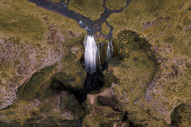 South Coast Sagas: Small Group Tour with Pick-up from Reykjavik - Sólheimajökull glacier close-up: seeing ice without the hike