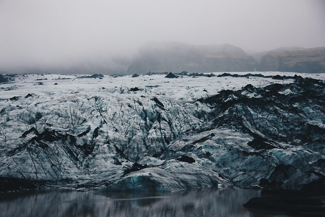 South Coast, Waterfalls and Black Sand Beach (Small Group Tour) - Reynisfjara Black Sand Beach: Basalt, Rocks, and Stories You’ll Remember