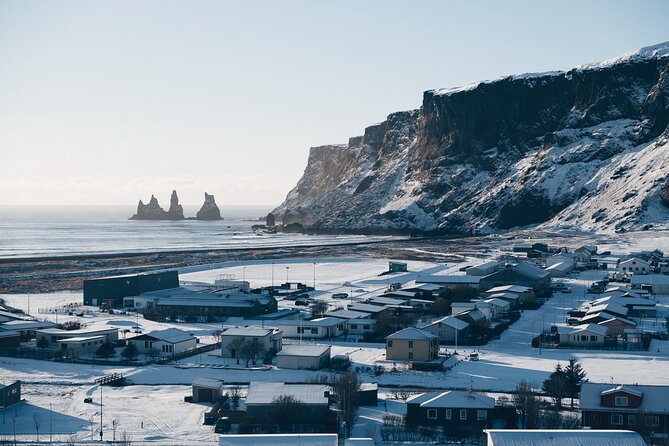 South Iceland Highlights and Northern Lights Combo Full-Day Tour - Sólheimajökull Glacier: Touching Ice and Learning What Retreat Looks Like